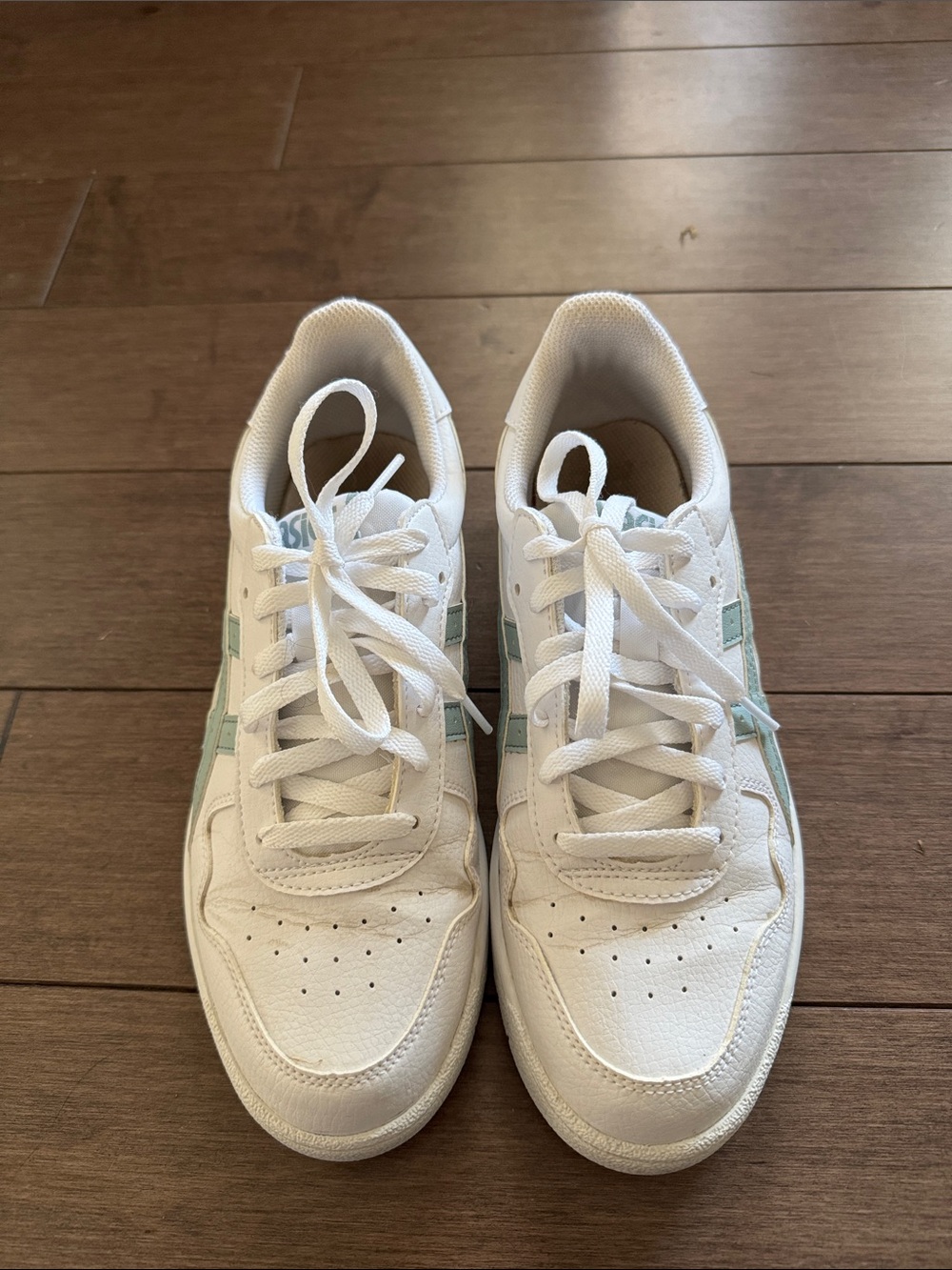 White Sneakers with Sage Green Accents